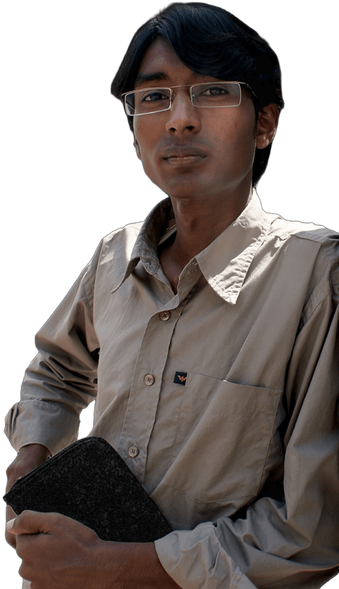 Raj holding a Bible